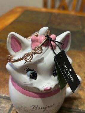 Kate Spade “Bow Meets Girl” Rose Gold Hinged Bangle Bracelet